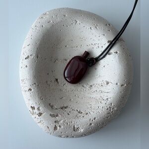 Burgundy pocket perfume bottle On Black Cord necklace